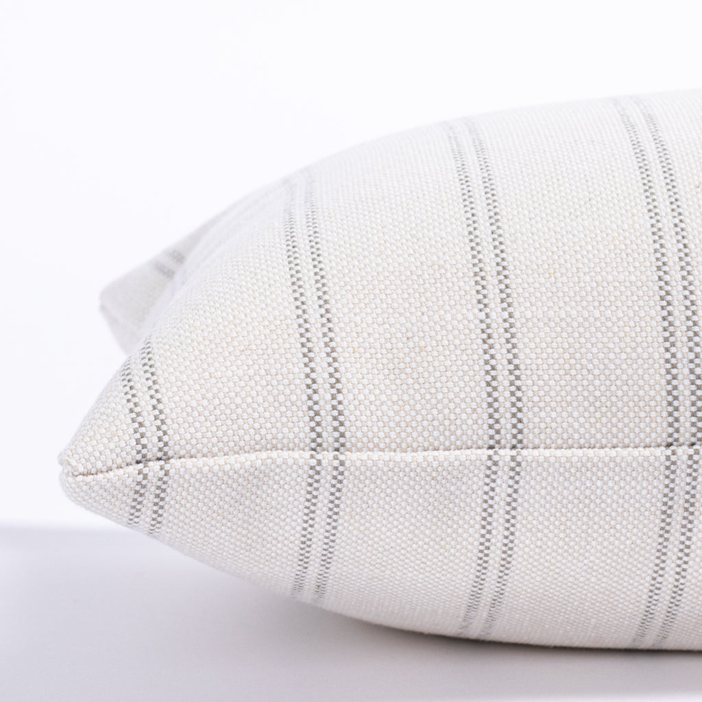 cream and grey vertical stripe lumbar pillow : side close up view 2