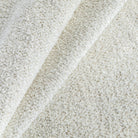 a cozy cream boucle upholstery fabric 