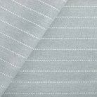Fontana Cloud, a pale blue grey and white stripe indoor outdoor fabric from Tonic Living