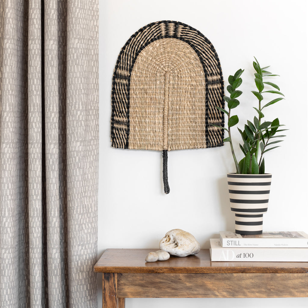 Graphic Home decor accessories : Fortuna black and natural woven fan on wall, Ewan black and cream vase on table