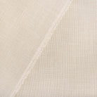 Grange Fabric Parchment, a high performance sandy beige upholstery fabric: close up view 2