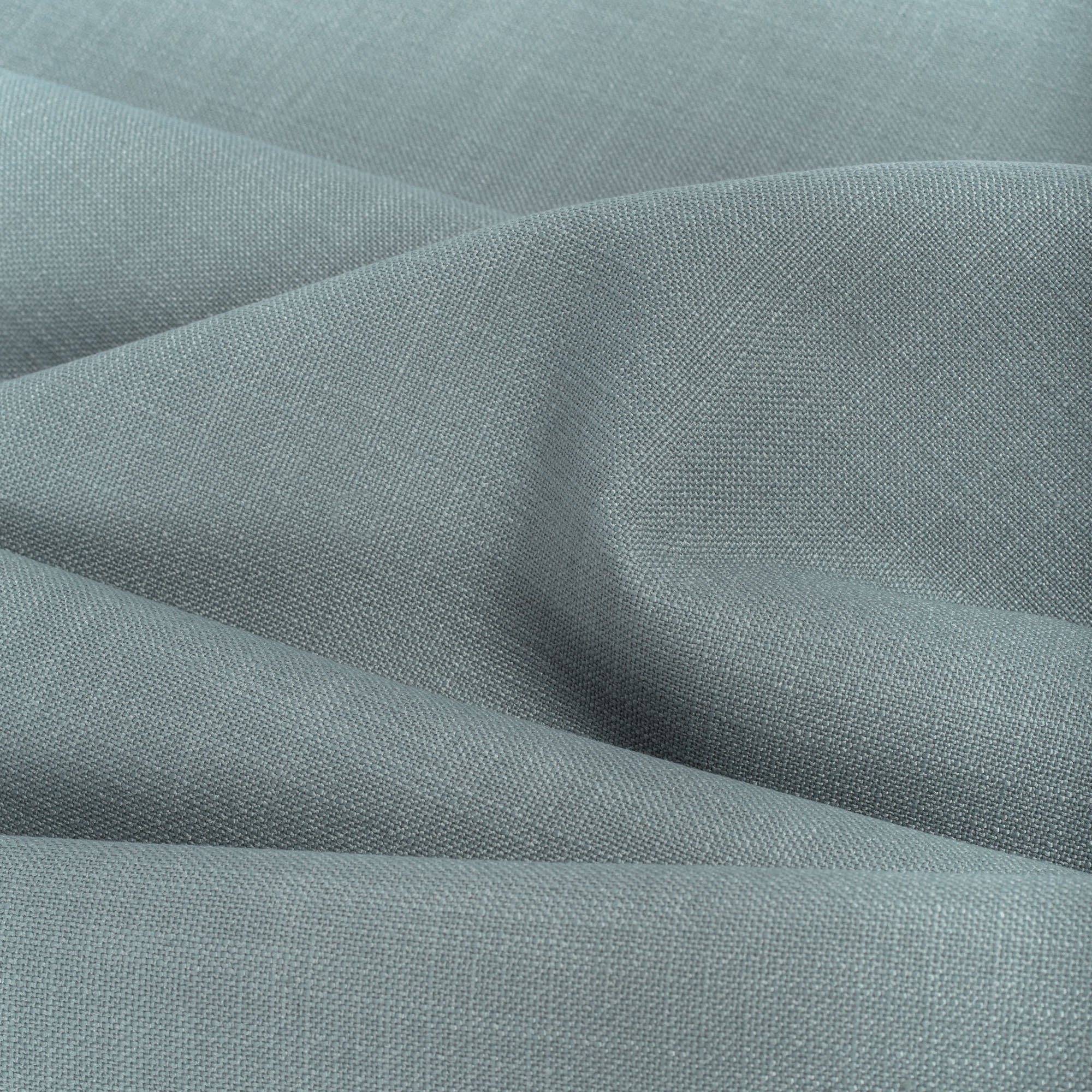 Grange Fabric Seaspray, a watery blue high performance upholstery fabric with a subtle textural weave from Tonic Living