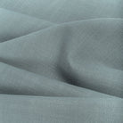 Grange Fabric Seaspray, a watery blue high performance upholstery fabric with a subtle textural weave from Tonic Living