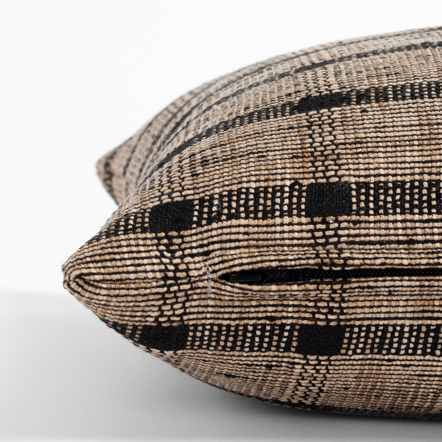 brown and black plaid check lumbar pillow : zipper detail