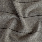 a textured tonal grey stripe upholstery fabric