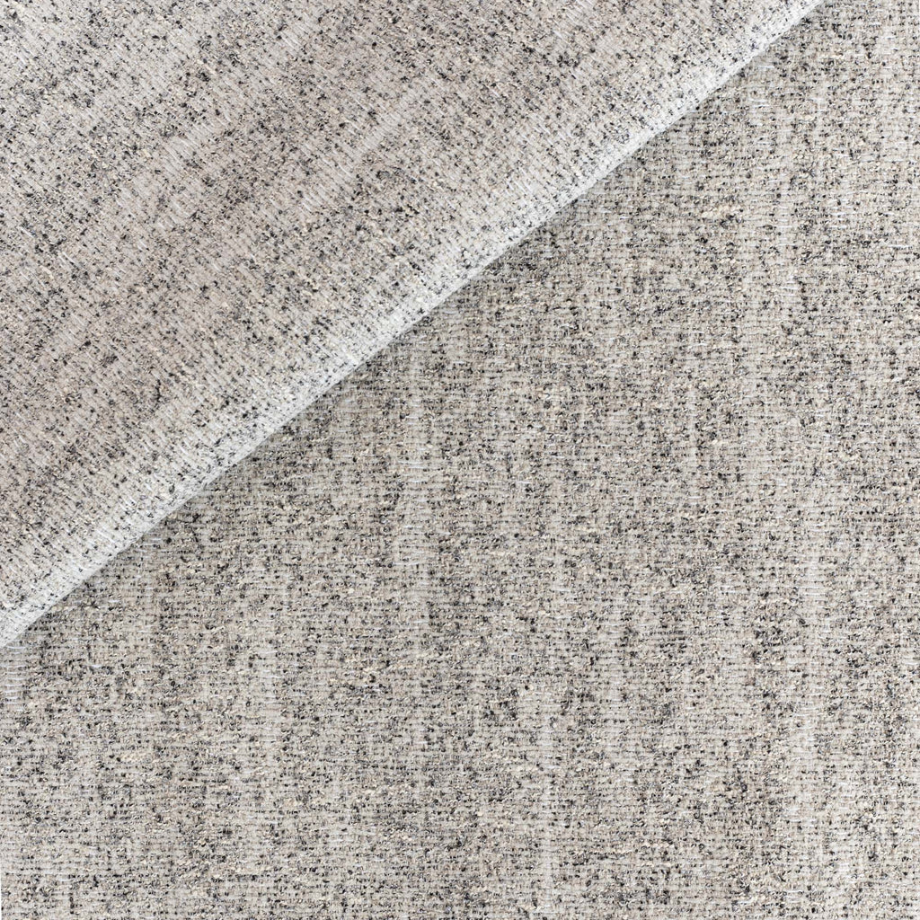 Heywood Fabric Pepper, a white cream upholstery fabric with sand, silver grey and charcoal speckles from Tonic Living