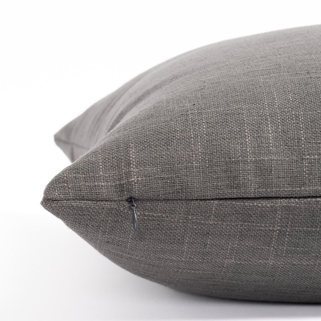 a smoke grey throw pillow : zipper detail