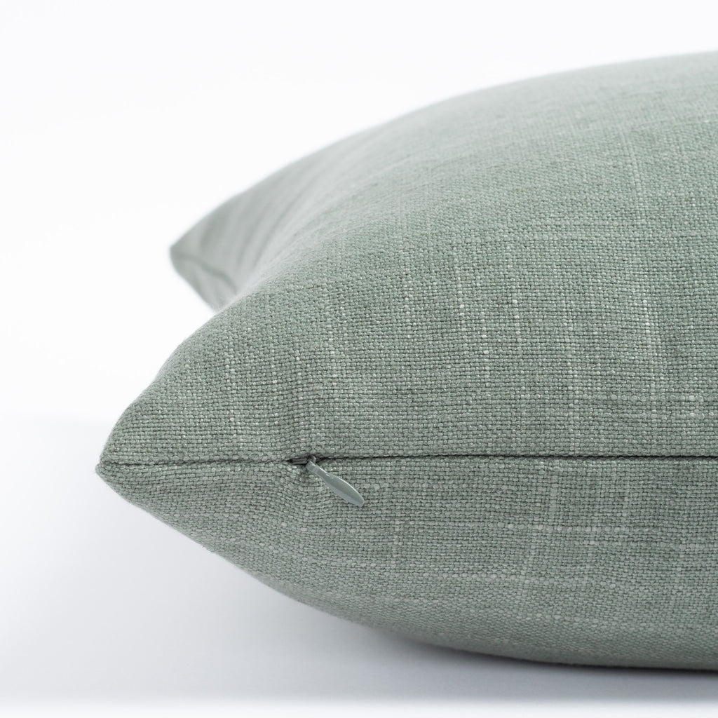 a watery jade green throw pillow : zipper detail
