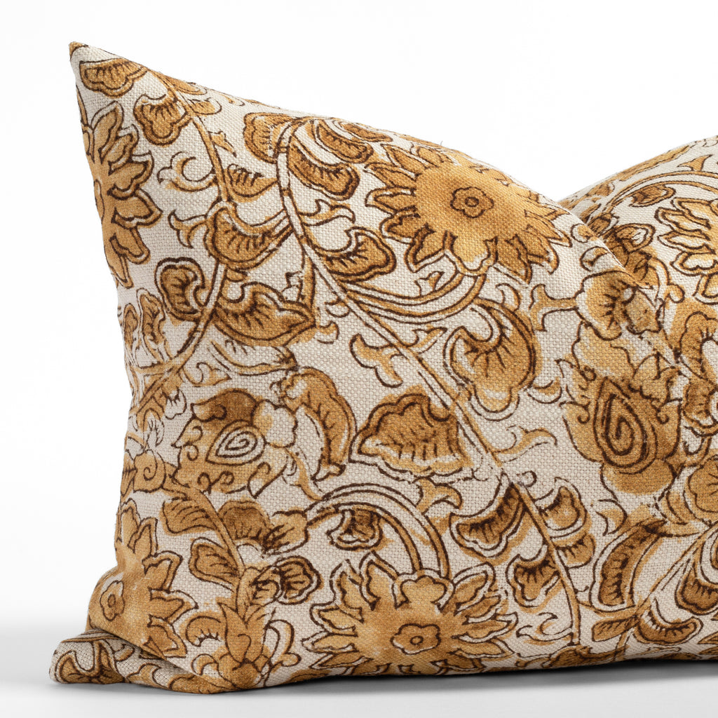 a gold, ochre and brown floral print lumbar throw pillow 