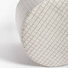 Keely Check Birch Ottoman, a cream and grey windowpane check round ottoman : close up of top