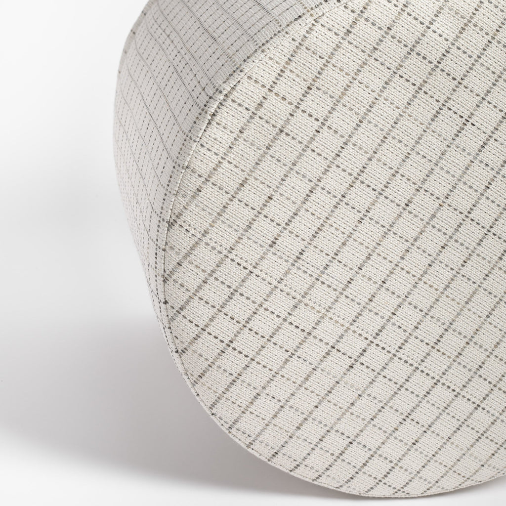 Keely Check Birch Ottoman, a cream and grey windowpane check round ottoman : close up of top