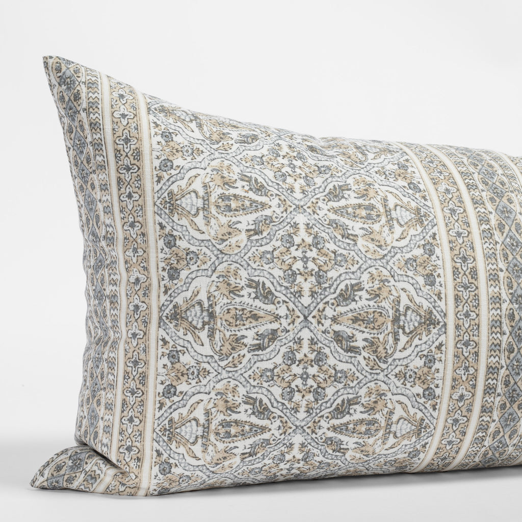 a tan and light blue-grey motif intricate block print bed bolster pillow