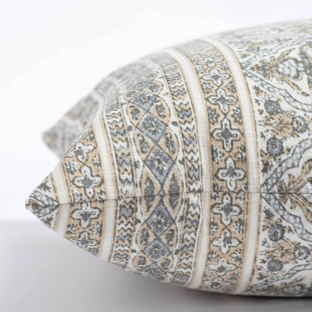 Lasha, a tan and light blue-grey block print throw pillow : side view