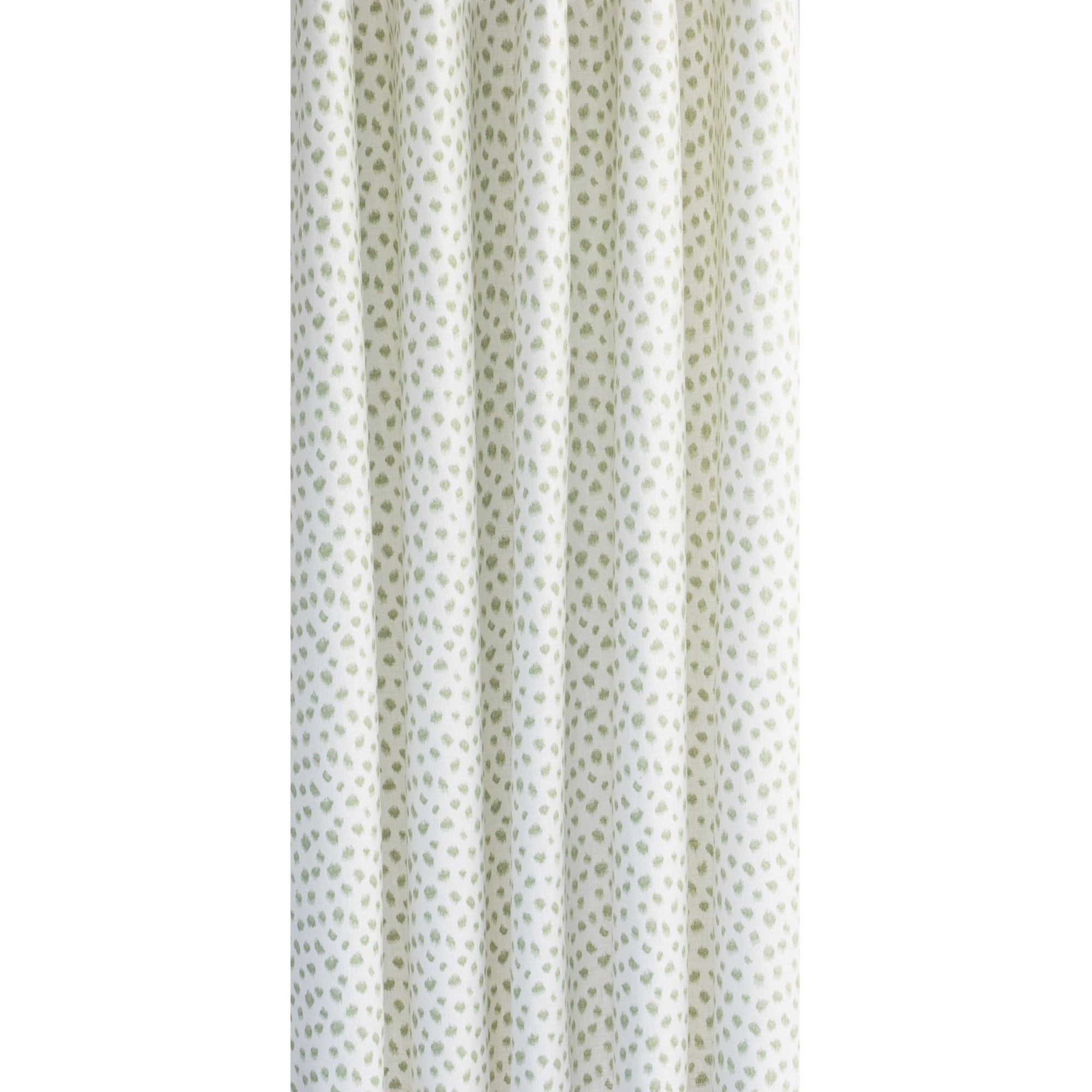 Mara, a white and green inky polka dot print drapery fabric