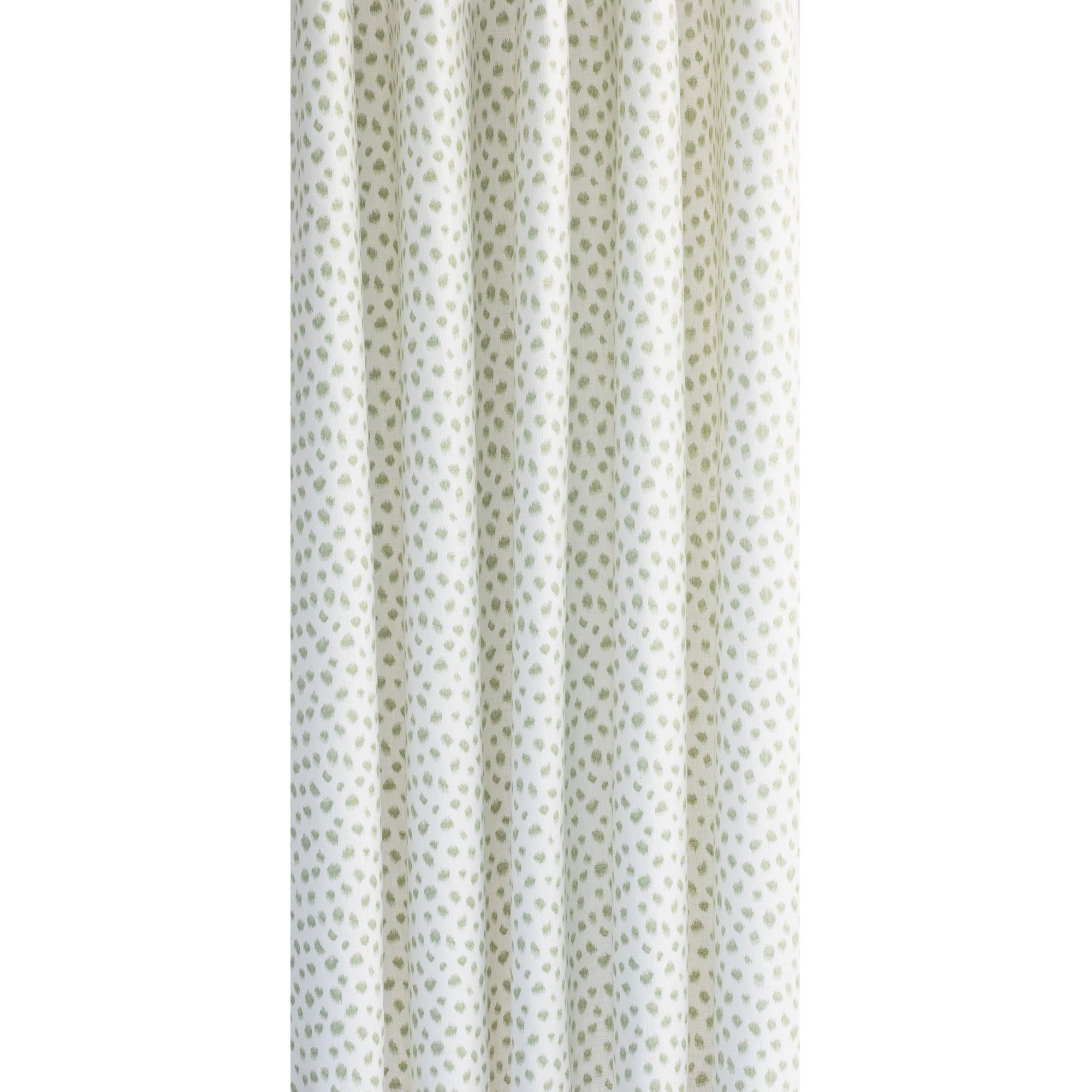 Mara, a white and green inky polka dot print drapery fabric