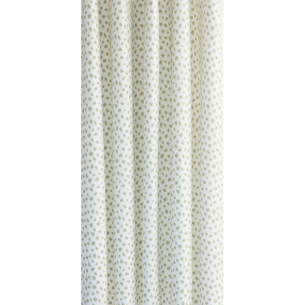 Mara, a white and green inky polka dot print drapery fabric