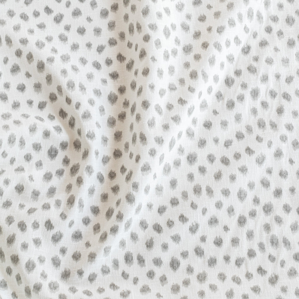 Mara Spot Soft Grey, a white and silver grey inky dot print fabric from Tonic Living