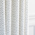 a white and silver grey inky dot print drapery fabric