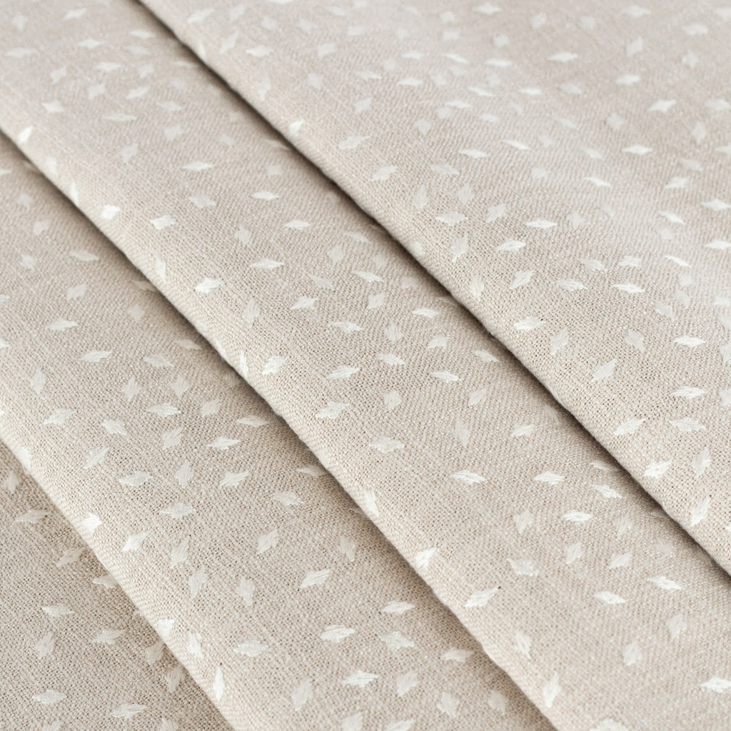 Masie Pearl, a sandy beige home decor fabric with a scattering of embroidered ivory flecks : view 4