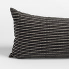 Misto charcoal bed bolster, a black and cream horizontal stripe extra long lumbar pillow : corner close up view