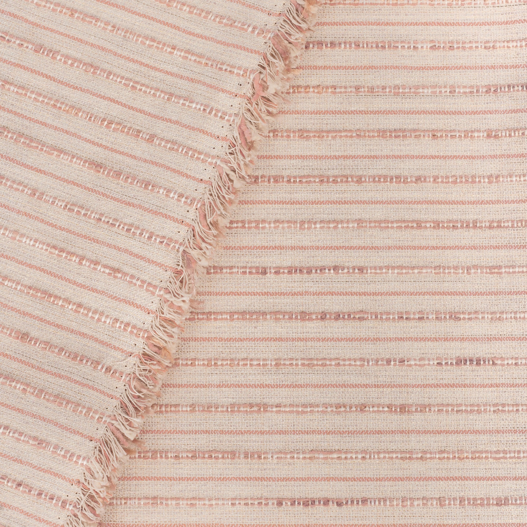 Misto Coral Blush, a light pink and light tan horizontal striped Crypton Home performance fabric : view with selvage edge 