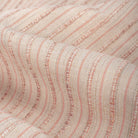 Misto Coral Blush, a light pink and light tan horizontal striped Crypton Home performance fabric : close up view