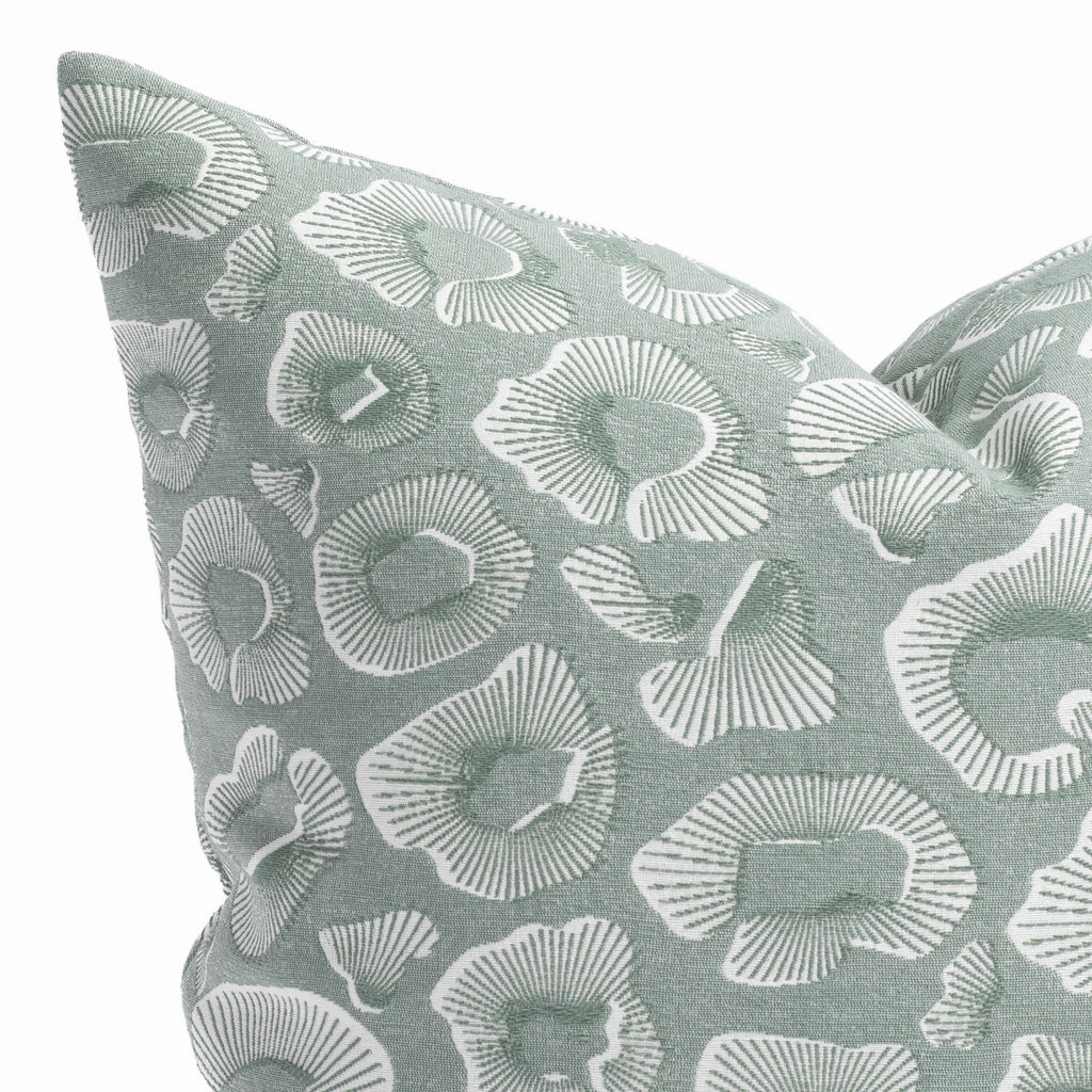 a watery blue green and white abstract ocean inspired pattern throw pillow : corner detail