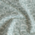Ocean Jade, a blue green and white abstract ocean motif pattern fabric from Tonic Living