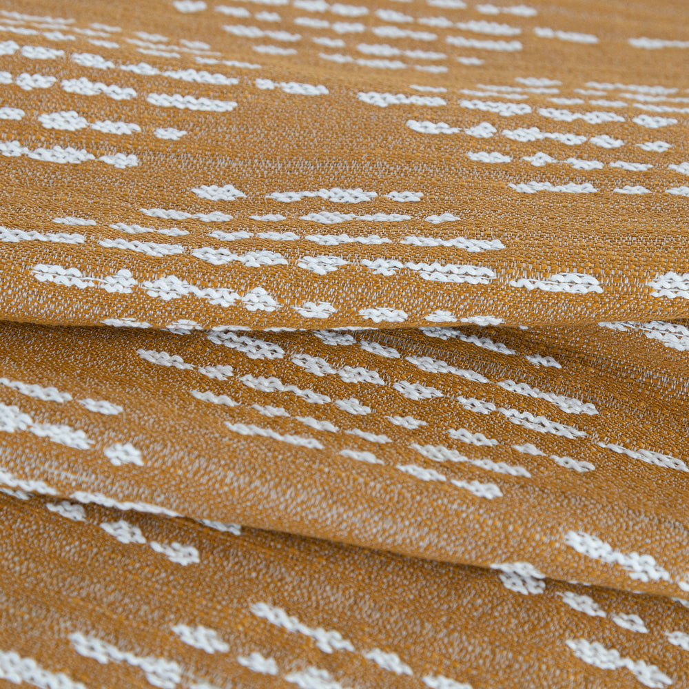 Ophelia Tumeric, a deep yellow on cream dash dot outdoor fabric from Tonic Living