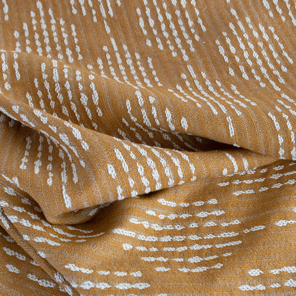 Ophelia Tumeric, a deep yellow on cream dash dot outdoor fabric from Tonic Living