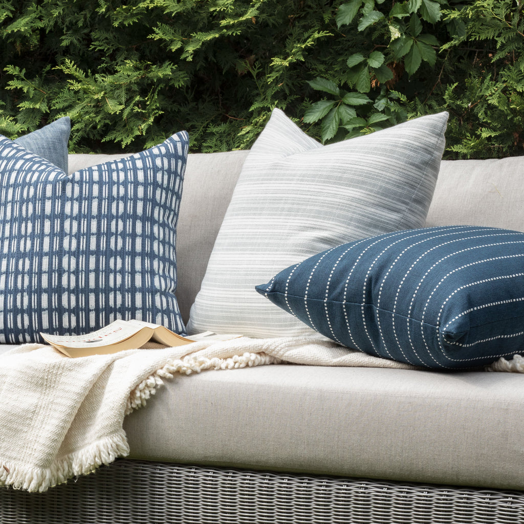 Outdoor Vignette : Light blue stripe and blue graphic pattern indoor outdoor pillow combo