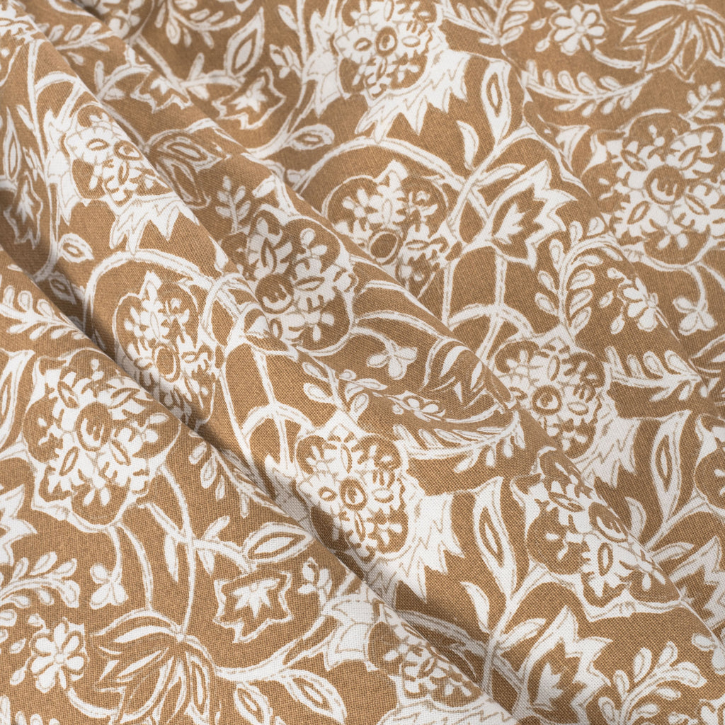Padma Nutmeg, a caramel brown and cream tapestry block print pattern cotton fabric : detailed view