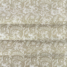 Padma Sand, a khaki beige and cream tapestry block print style cotton fabric: close up view