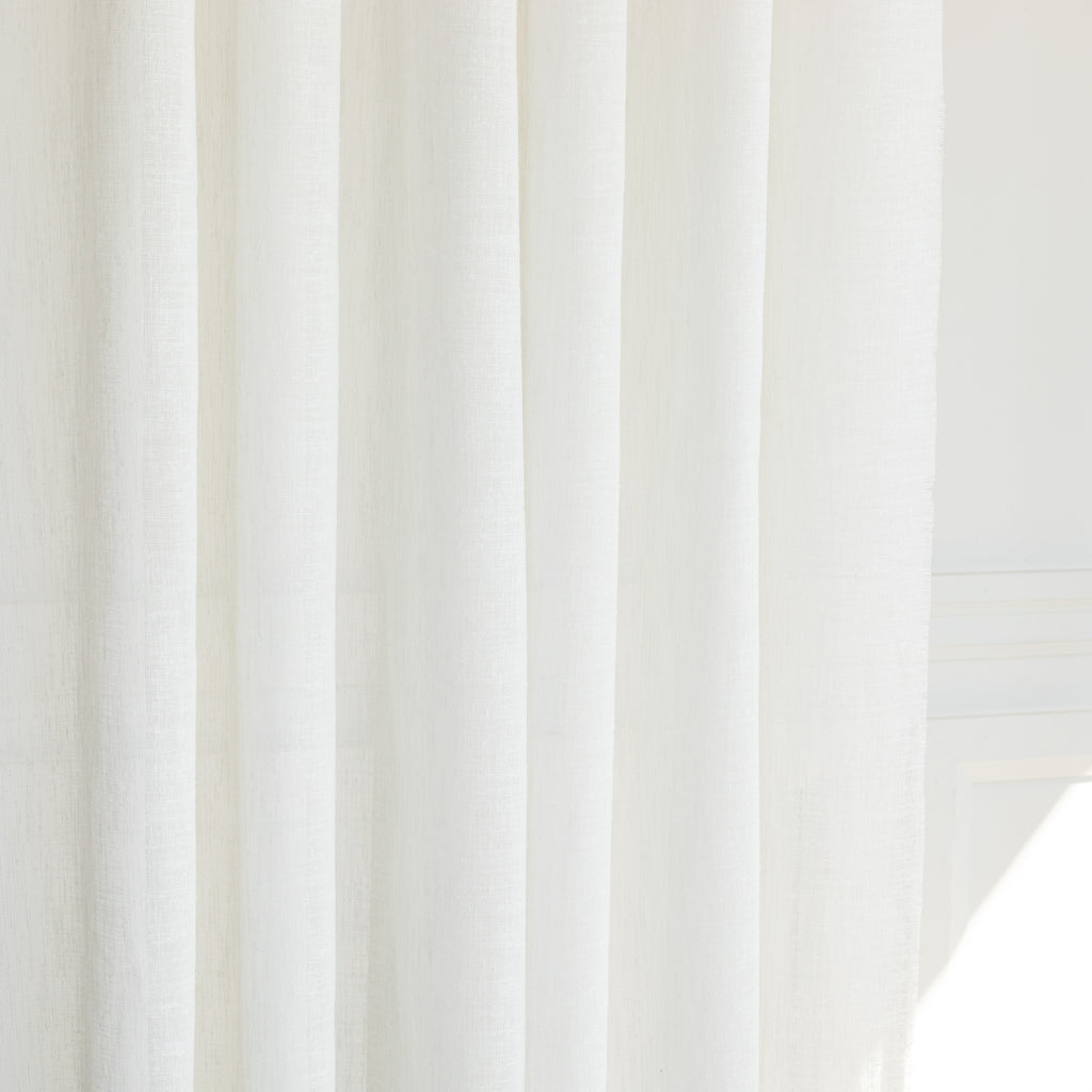 a soft creamy white drapery fabric