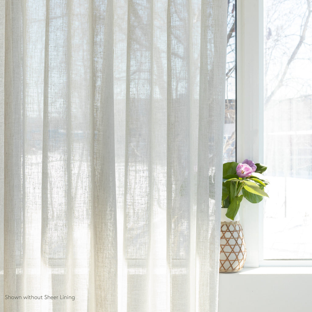 an oyster white sheer drapery fabric - shown without lining
