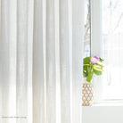 an oyster white sheer drapery fabric - shown with sheer lining
