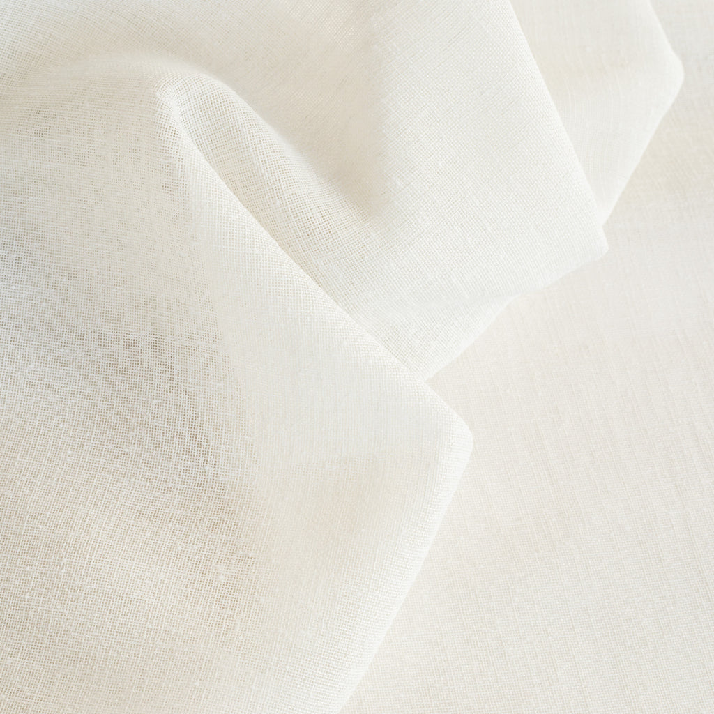 a cream white sheer tonic living drapery fabric by the yard