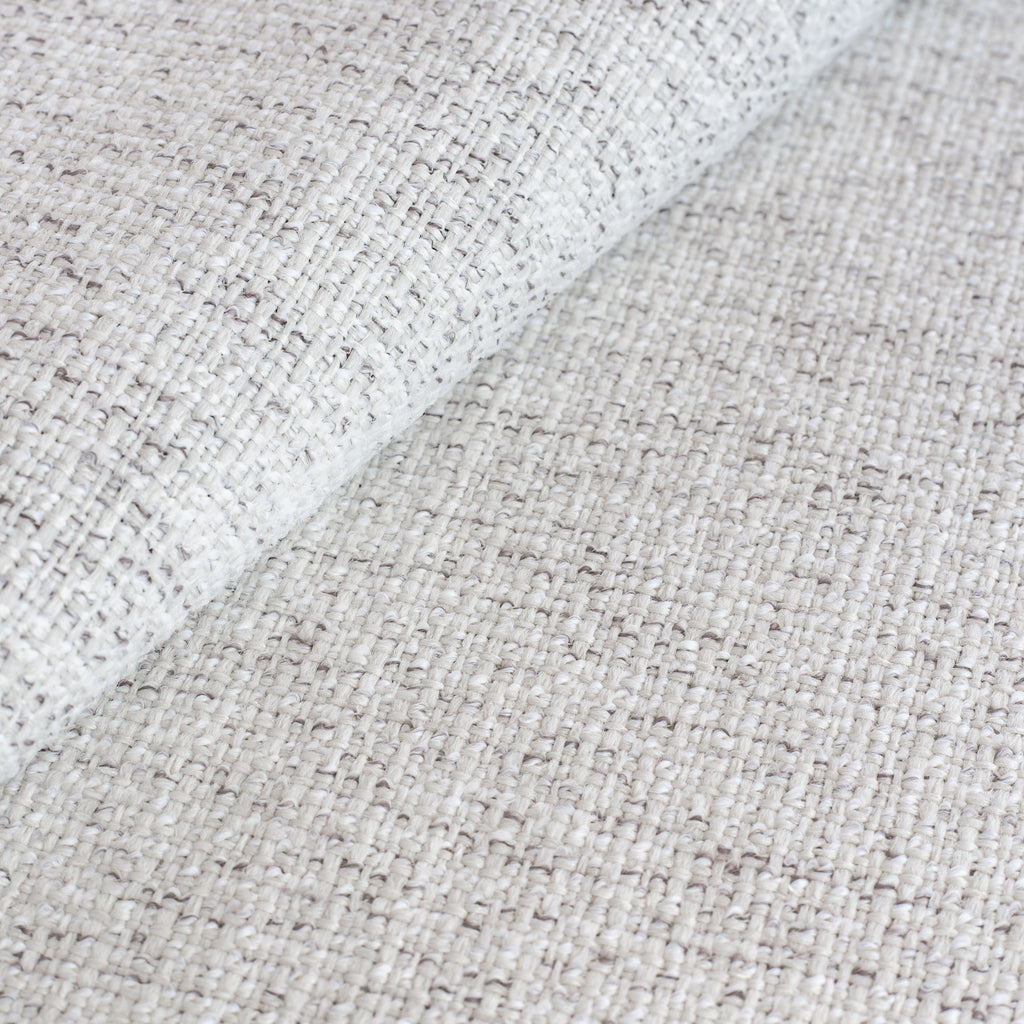 Preston Birch, a light cream with strands of warm grey performance upholstery fabric