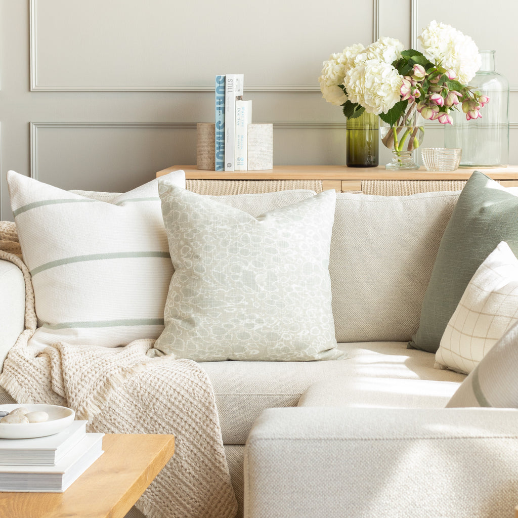 Serene soft green and white tonic living pillows