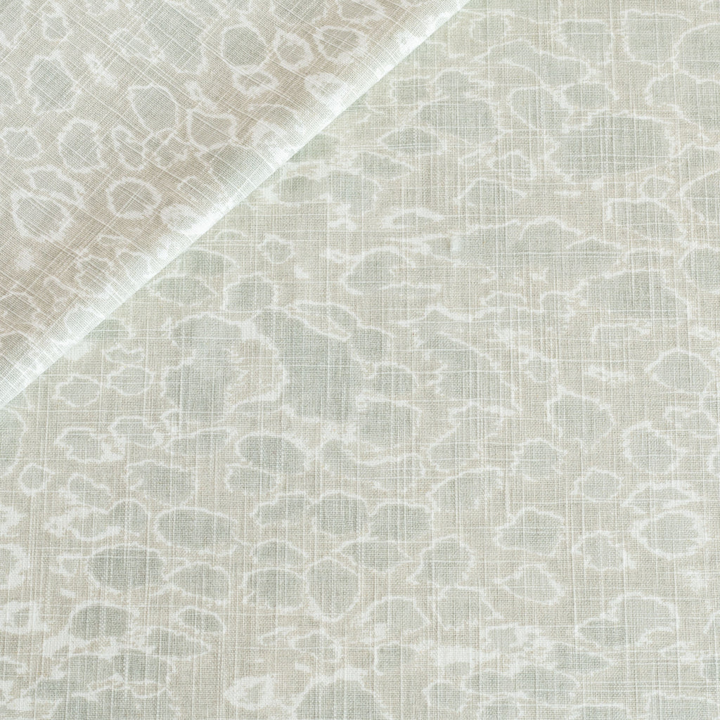 a watery mineral green abstract dabbled water print fabric 