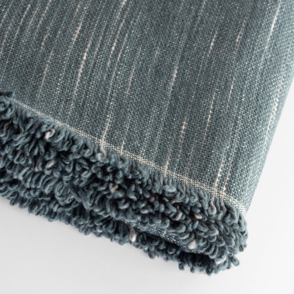 Rafael Stone Blue, a denim blue chunky weave cotton throw blanket from Tonic Living