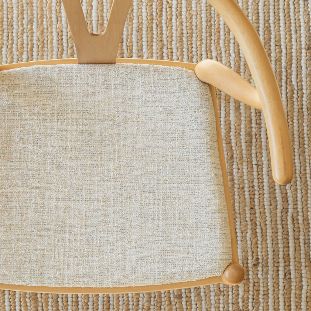 a sandy beige upholstery chair seat