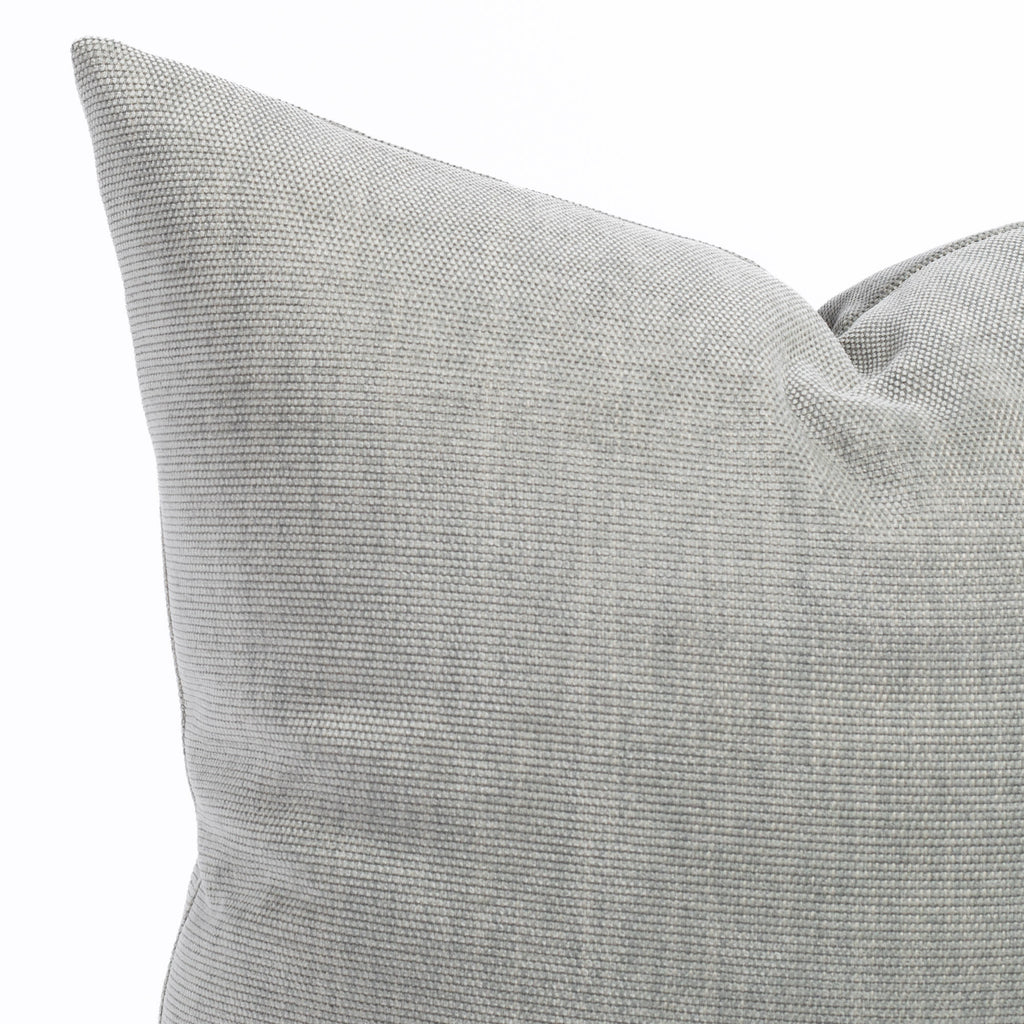 a soft light grey pillow : close up view