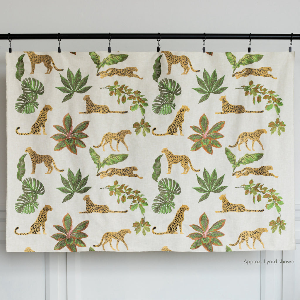 Savanna Topaz: a gold, black and green embroidered cheetah fabric : one yard cut