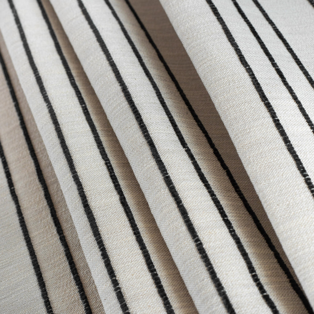 Spar Stripe Onyx, a flax cream with thin black stripe multipurpose upholstery fabric from Tonic Living view:5