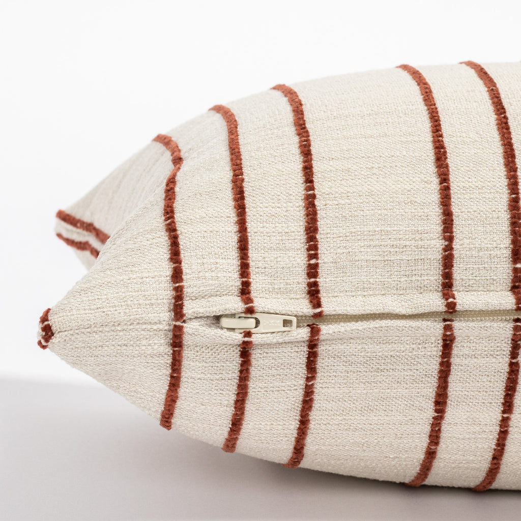 beige and rust stripe lumbar throw pillow : zipper side view