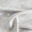 Stanhope Pearl fabric, a soft white and light grey woven home decor fabric from Tonic Living