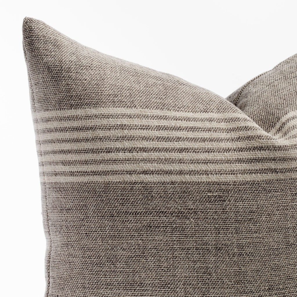 Stockton Stripe Graphite, a linen throw pillow, in shades of natural tan and faded black from Tonic Living : corner detail view