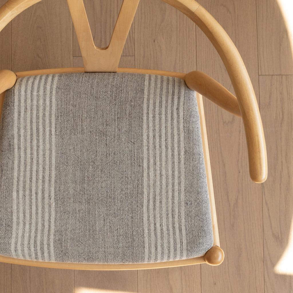 a grey and cream stripe upholstered chair seat