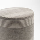 a natural tan and faded black striped linen round ottoman : top view